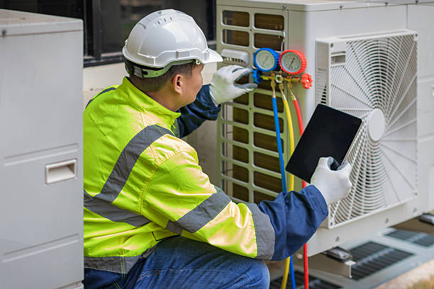 Professional Ductwork Repair technician working in Pikesville, MD